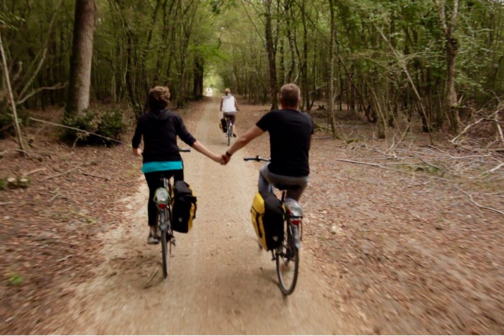 holding-hands-bike-ride